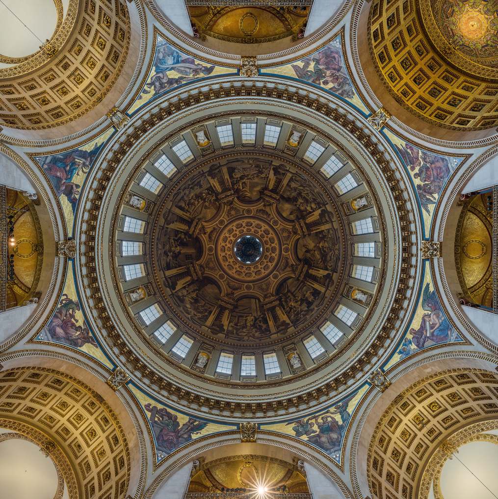 Looking straight up into the painted and gilded dome of St Paul's Cathedral.