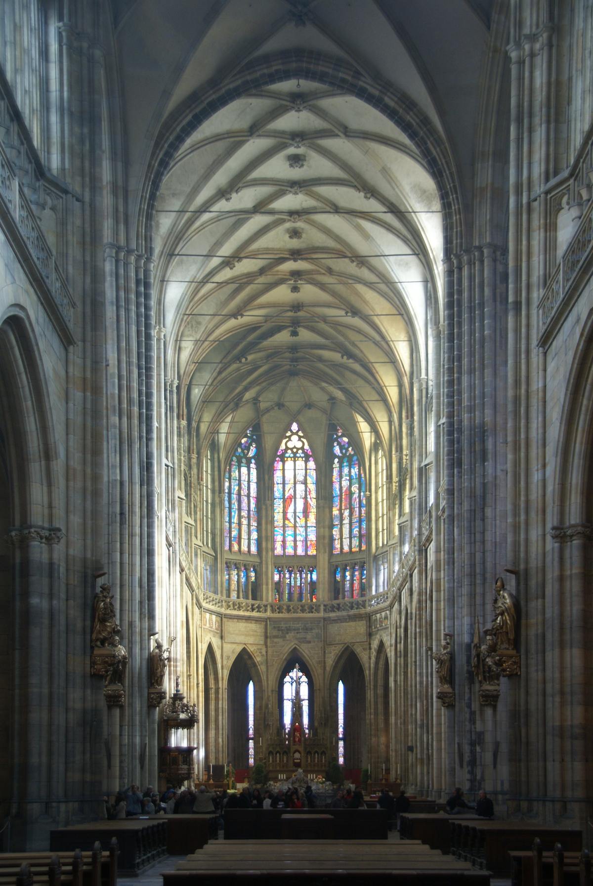 The tall Gothic nave and ribbed vaulting of St Vitus Cathedral in Prague.